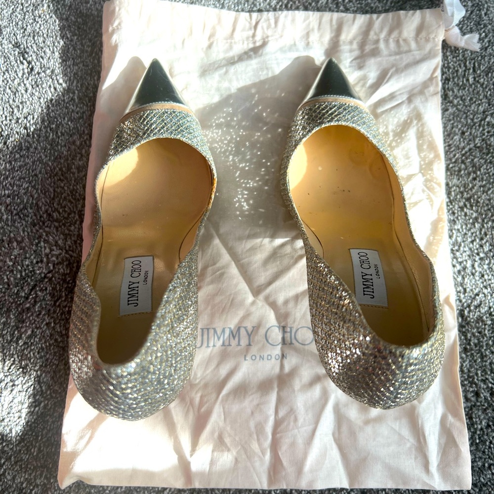 Jimmy Choo London silver shinning Pumps.